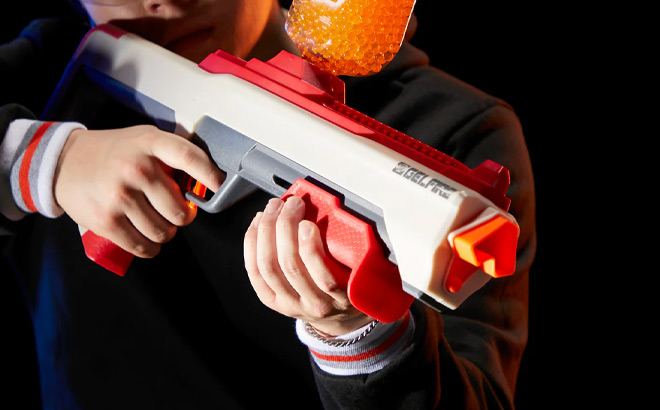 a Kid Holding NERF Pro Gelfire Raid Blaster
