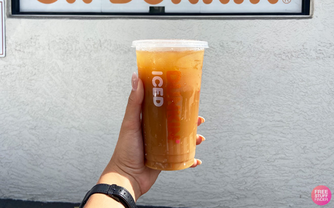 a Person Holding Dunkin Iced Coffee a Person Holding Dunkin Iced Coffee