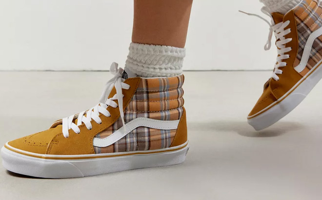 a Person Wearing VANS Sk8 Hi Plaid Sneakers a Person Wearing VANS Sk8 Hi Plaid Sneakers