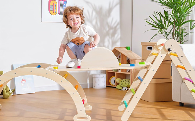 A Child Playing on the Yoyojoker 5 in 1 Pikler Triangle Set