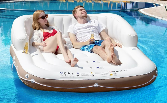A Couple on a Costway Floating Island Inflatable Lounge Raft Pool Float
