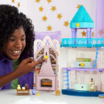 A Girl Playing With Disney Wish Rosas Castle Playset