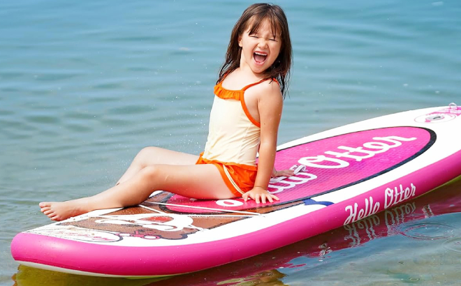 A Girl Sitting on Tuxedo Sailor Kids Inflatable Paddle Board