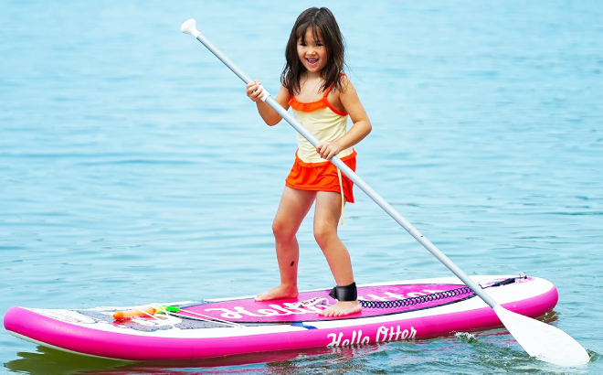 A Girl Standing on Tuxedo Sailor Kids Inflatable Paddle Board