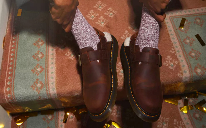 A Man Wearing Dr. Martens Jorge II Faux Fur Lined Slingback Mules