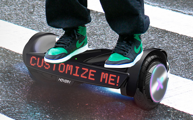 A Person Driving Hover 1 Sypher Hoverboard with Customizable Screen