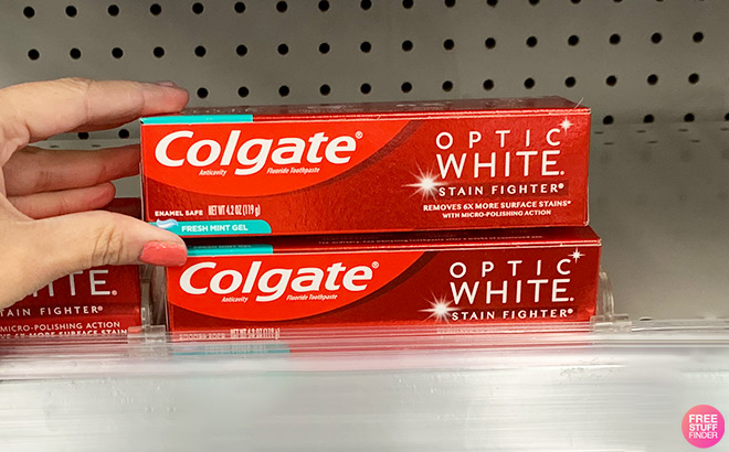 A Person Holding Colgate Stain Fighter Whitening Toothpaste