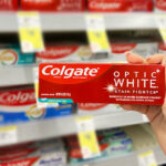 A Person Holding Colgate Whitening Toothpaste