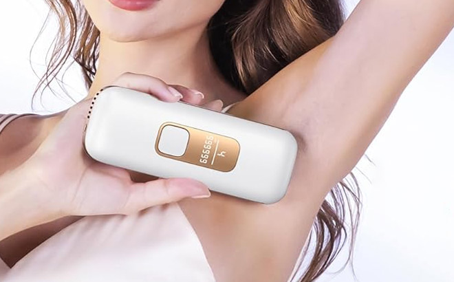 A Person Holding Hair Removal Device