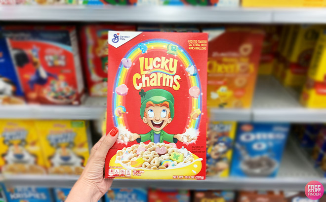 A Person Holding Lucky Charms Cereal with Marshmallows