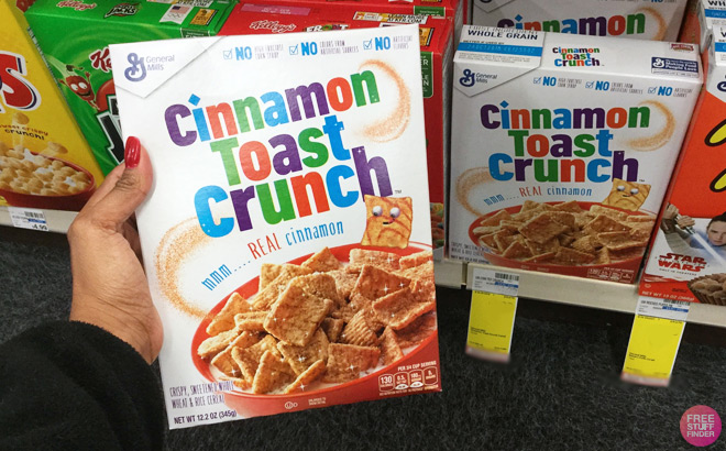 A Person Holding a Box of Cinnamon Toast Crunch Breakfast Cereal
