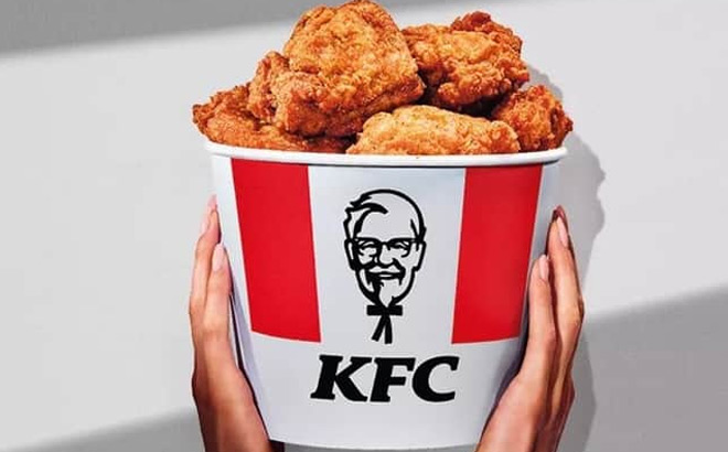 A Person Holding a Bucket of KFC Friend Chicken
