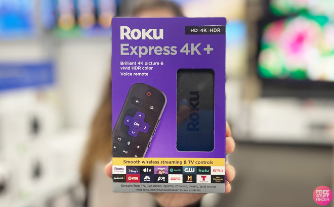 A Person Holding a Roku Express 4K Streaming Device