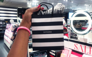 A Person Holding a Sephora Bag inside a Store