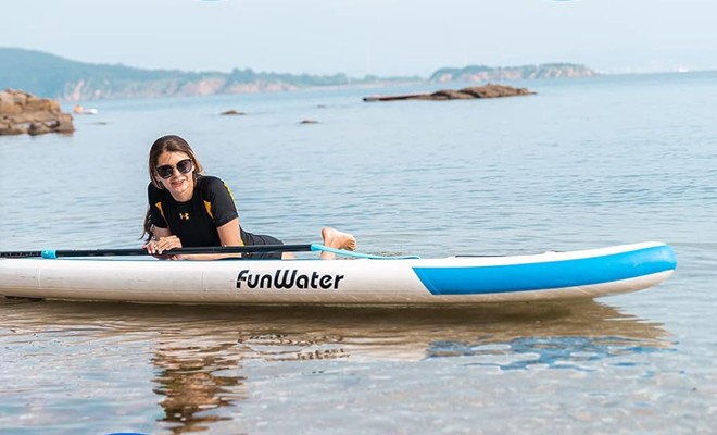 A Person Lying on the FunWater Inflatable Ultra Light Stand Up Paddle Board