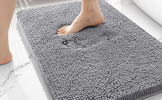 A Person Standing on Bathroom Rug