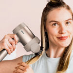 A Person Using Shark HyperAIR Ionic 2 in 1 Blow Dryer
