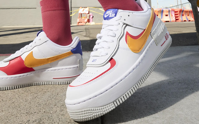 A Person Wearing Nike Air Force 1 Shadow Womens Shoes