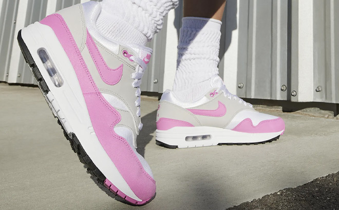 A Person Wearing Nike Air Max 1 Womens Shoes