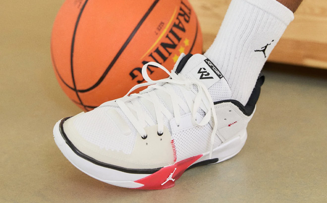 A Person Wearing Nike Jordan One Take 5 Basketball Shoes