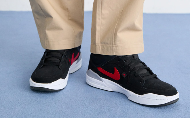 A Person Wearing Nike Jordan Stadium 90 Mens Shoes