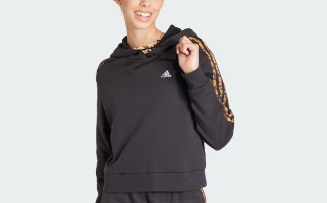 A Person Wearing an Adidas Essentials 3 Stripes Animal Print Relaxed Hoodie