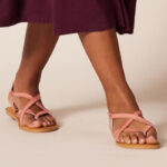 A Person Wearing the Amazon Essentials Womens Casual Strappy Sandals in Pink