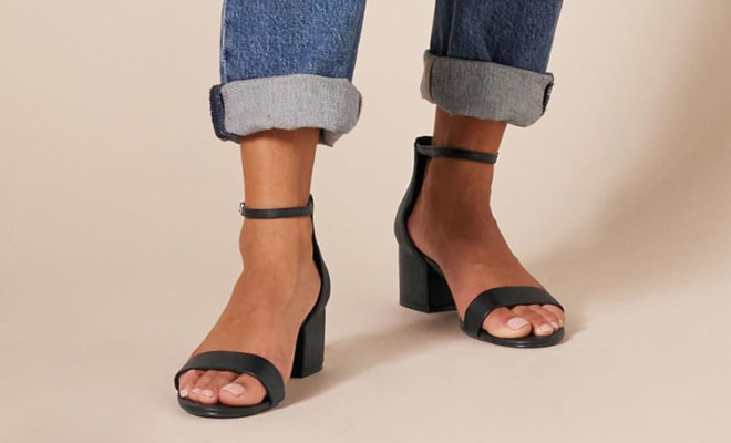 A Person Wearing the Amazon Essentials Womens Two Strap Heeled Sandals in Black