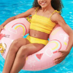 A Person on Bluescape Pink Sweets Inflatable Swim Tube Pool Float