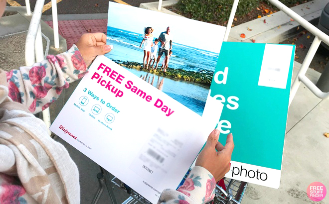 A Woman Holding a 8x10 Photo Print with Free Same Day Pickup from Walgreens Photo
