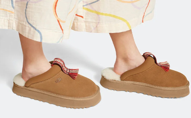 A Woman Wearing UGG Tazzle Slippers in Chestnut