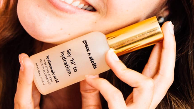 A lady holding Grace and Stella Hyaluronic Acid Serum A lady holding Grace and Stella Hyaluronic Acid Serum