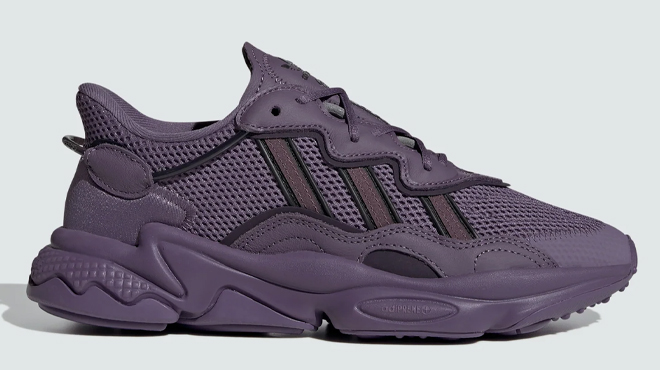 A photo of Adidas Womens Ozweego Shoes Shadow Violet