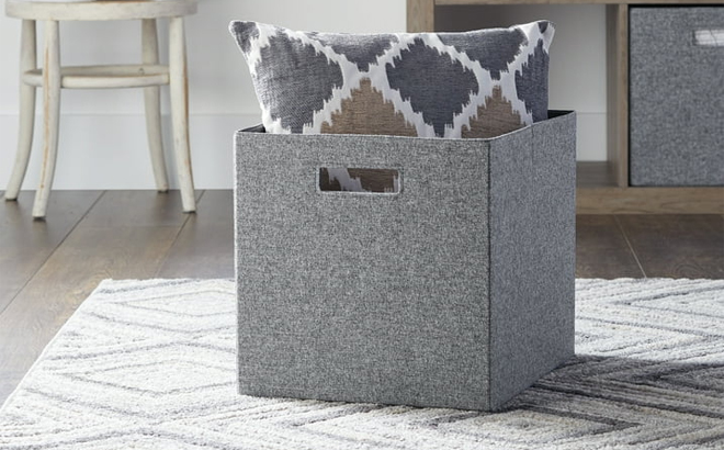Better Homes Gardens 12 Inch Fabric Cube Storage Bin in the Color Gray on the Floor in a Room