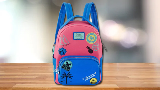 Disney Vacation Club Loungefly Mini Backpack on a Table Disney Vacation Club Loungefly Mini Backpack on a Table