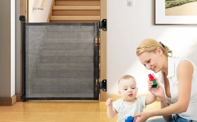 Doulami Retractable Baby Mesh Safety Gate Paced Before the Stairs