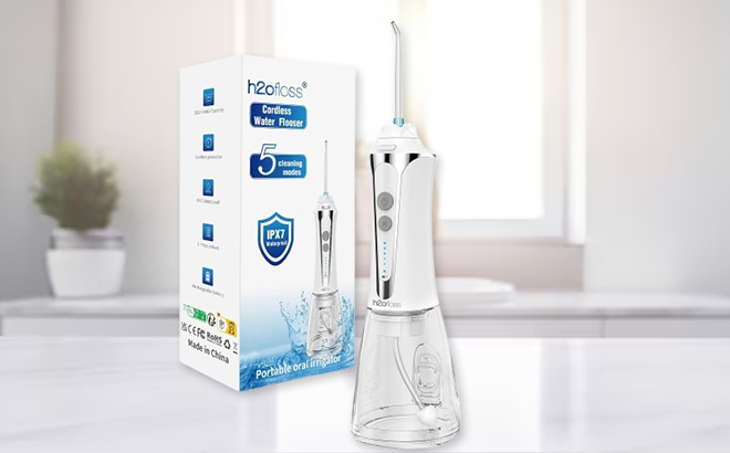 H2ofloss Cordless Water Dental Flosser on a Marble Table