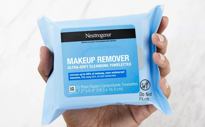 Hand Holding Neutrogena Facial Cleansing Makeup Remover Wipes 25 Count