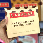 Hand holidng Larabar Chocolate Chip Cookie Dough Bar 6 Count