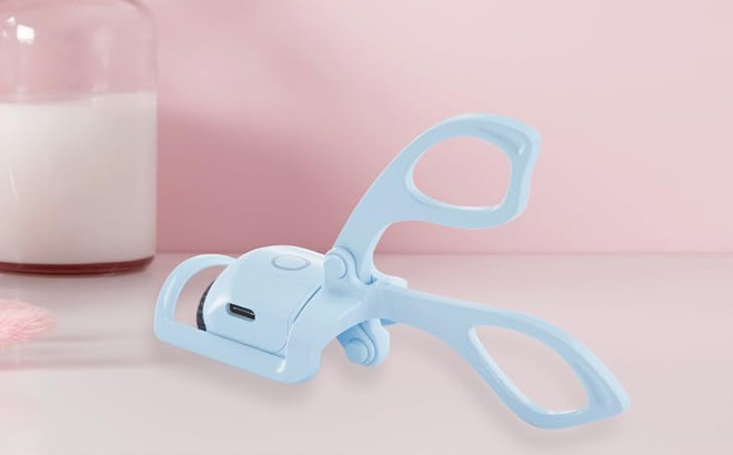 Heated Eyelash Curler on a Table Heated Eyelash Curler on a Table