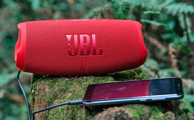 JBL Charge 5 Portable Waterproof Speaker with Powerbank Connected to a Phone