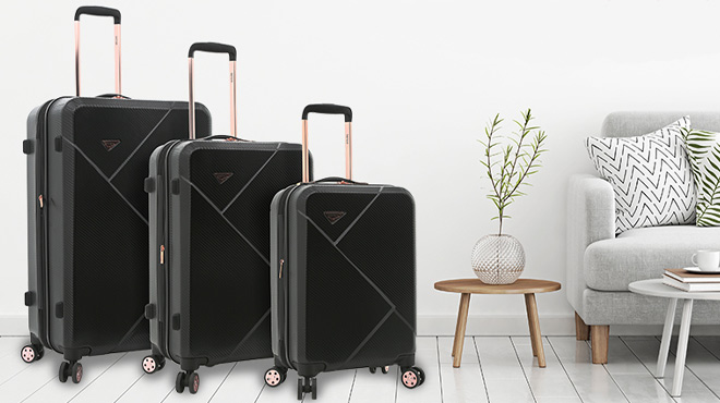 Kensie Dawn Hardside Spinner Luggage 3 Piece Set in a Living Room Kensie Dawn Hardside Spinner Luggage 3 Piece Set in a Living Room