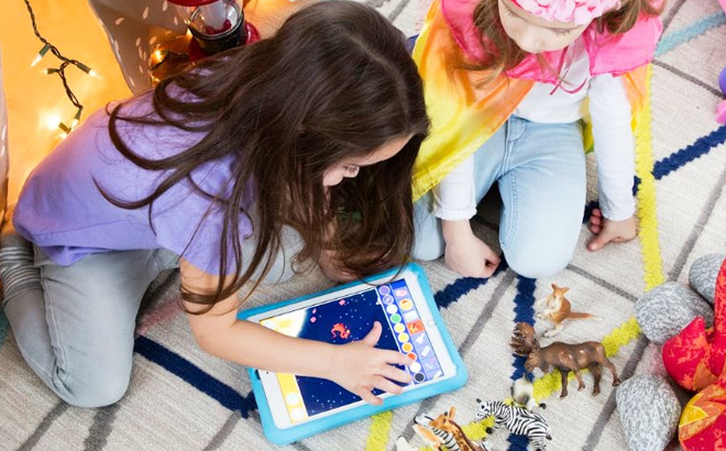 Kids in a Room Playing and Learning with Homer App