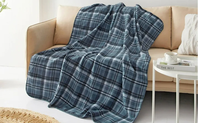 Mainstays Blue Plaid Plush Throw Blanket on a Couch