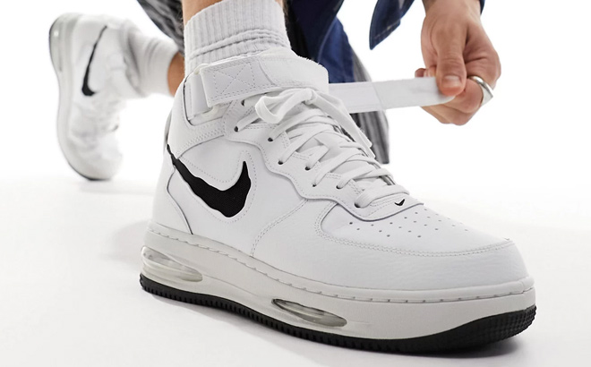 Nike Air Force 1 Mid Remastered sneakers in white and black