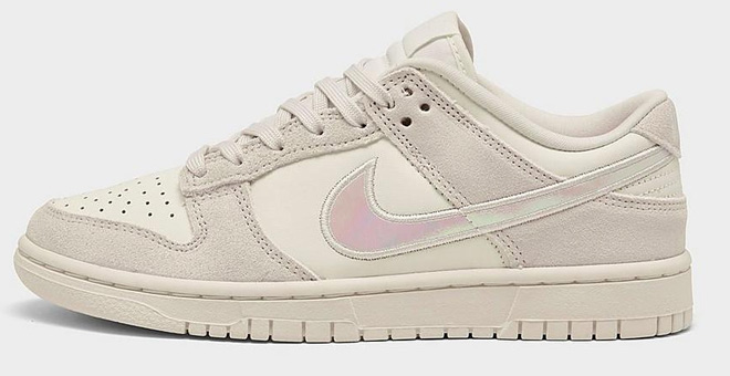 Nike Womens Dunk Low Casual Shoes on Gray Background Nike Womens Dunk Low Casual Shoes on Gray Background