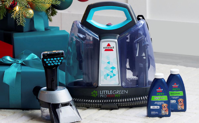 Person Cleaning with Bissell Portable Carpet Cleaner 1