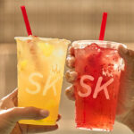 Persons Holding SK Refreshers from Smoothie King