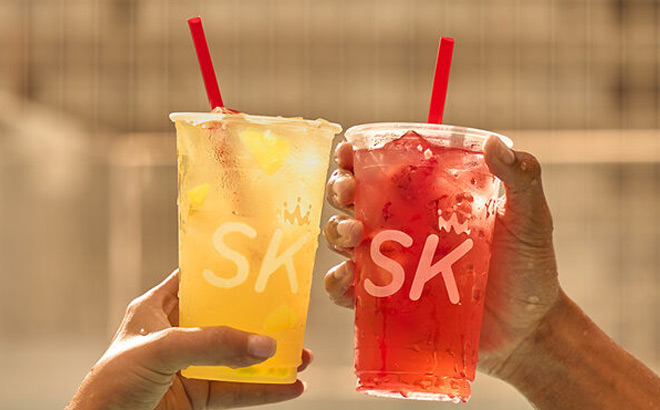 Persons Holding SK Refreshers from Smoothie King