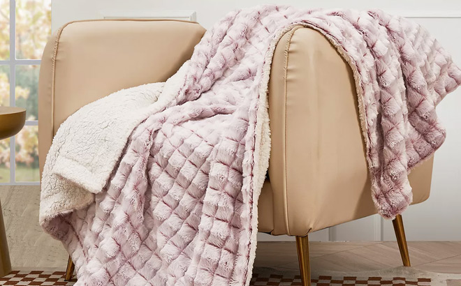 Royal Luxe Reversible Micromink to Faux Sherpa Throw in Pale Pink
